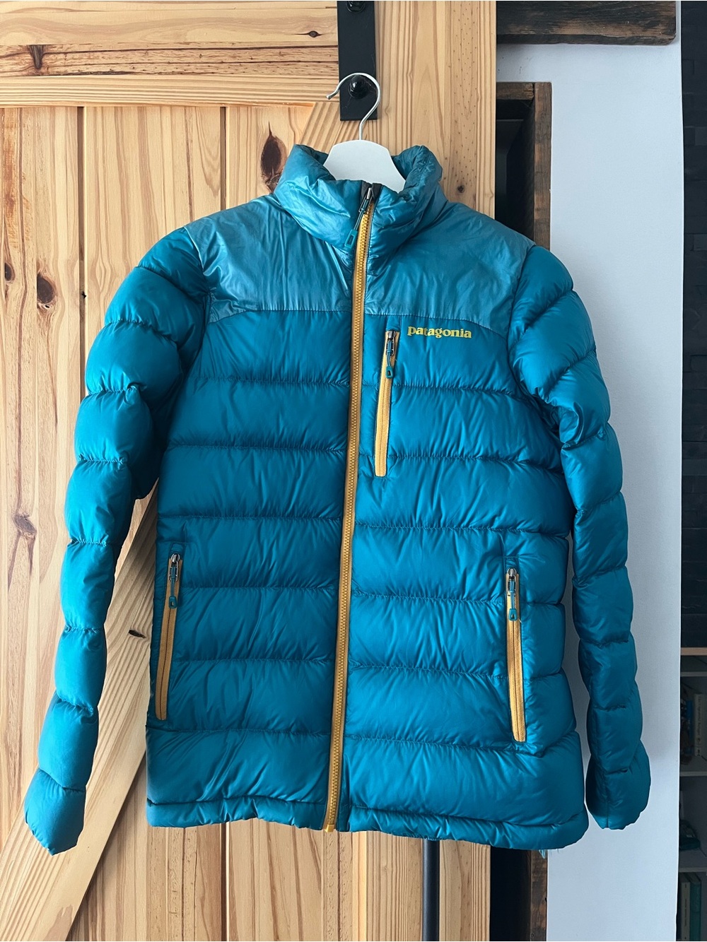 Patagonia Teal Puff Jacket with Yellow Zippers